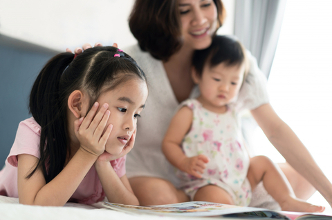 beautiful-asian-mother-reading-f.jpg